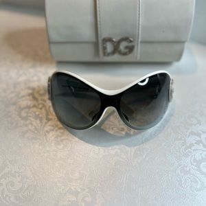 Dolce and Cabana white sunglasses with silver accents.